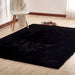 Caparica Black 5' X 7' Area Rug - Olympia Furniture (Saint George, Utah)