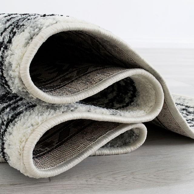 Serang Gray/Black 5' X 7' Area Rug - Olympia Furniture (Saint George, Utah)